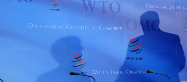 Дүниежүзілік сауда ұйымының логотипі Дүниежүзілік сауда ұйымының логотипі - Sputnik Қазақстан