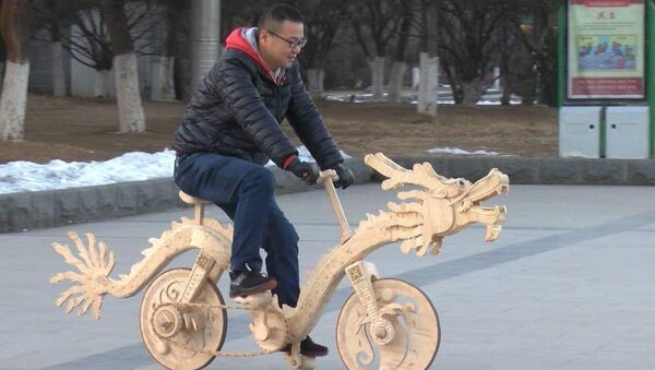 Китаец смастерил необычный велосипед - Sputnik Казахстан