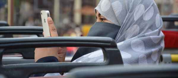 Женщина в хиджабе Женщина в хиджабе - Sputnik Казахстан