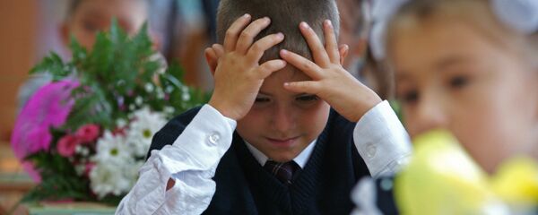 Школьник на уроке, архивное фото Школьник на уроке, архивное фото - Sputnik Казахстан