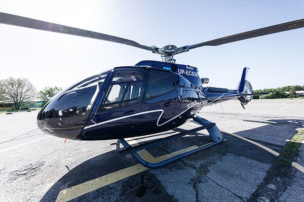 Вертолет Eurocopter ЕС130 Т2 под регистрационным номером UP-EC038 авиакомпании Sky Service - Sputnik Казахстан