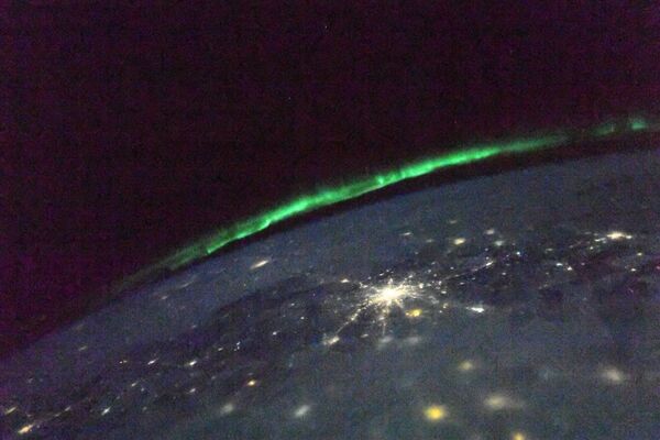 Полярное сияние на Земле, снятое с Международной космической станции - Sputnik Казахстан