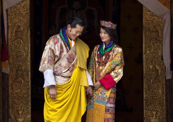 Король Бутана Джигме Кхесар Намгьял Вангчук и его жена Джецун Пема в день бракосочетания - Sputnik Казахстан