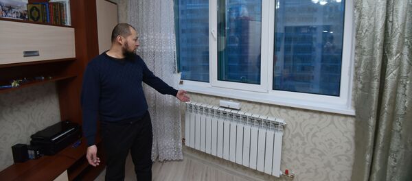 Семья погорельцев из Астаны Семья погорельцев из Астаны - Sputnik Казахстан