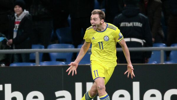 Нападающий сборной Казахстана Вороговский празднует гол в ворота Шотландии - Sputnik Казахстан