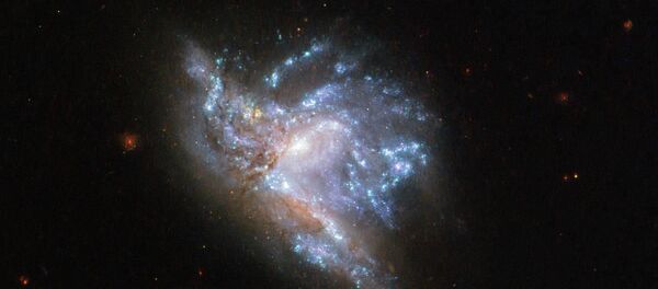 Космический снимок сталкивающихся галактик, архивное фото - Sputnik Казахстан