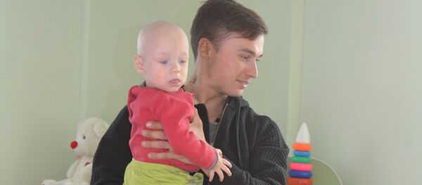 Велогонщик Алексей Луценко в детдоме Велогонщик Алексей Луценко в детдоме - Sputnik Казахстан