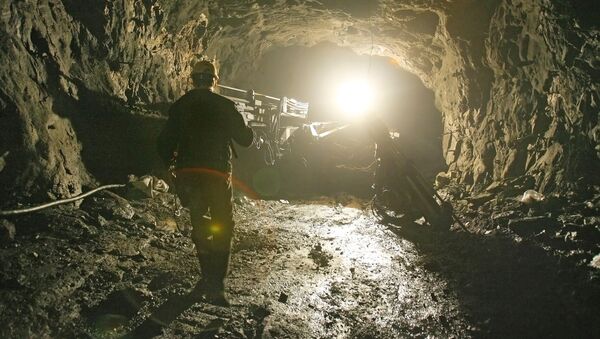 Архивное фото шахтера на руднике - Sputnik Казахстан