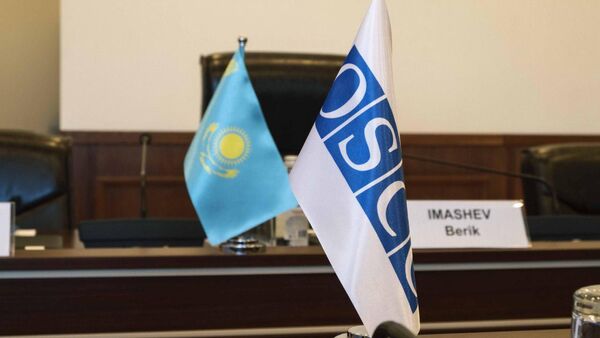 Флаги республики Казахстан и ОБСЕ в ЦИК РК - Sputnik Казахстан