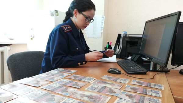 Пенсионерку из Северного Казахстана обманула мошенница, обменяв сбережения на фальшивые купюры - Sputnik Казахстан