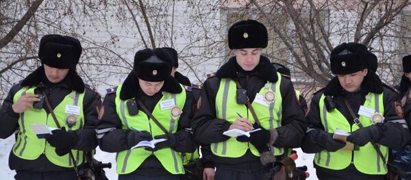 Архивное фото казахстанских полицейских Архивное фото казахстанских полицейских - Sputnik Казахстан