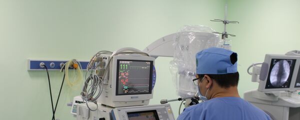 Врач в палате, архивное фото Врач в палате, архивное фото - Sputnik Казахстан