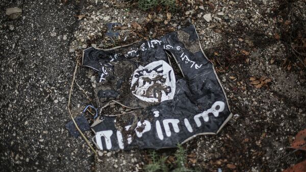 Флаг радикальной исламистской организации Исламское государство. Архивное фото - Sputnik Казахстан