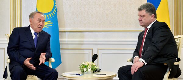 Нұрсұлтан Назарбаев пен Петр Порошенко. Архивтегі фото Нұрсұлтан Назарбаев пен Петр Порошенко. Архивтегі фото - Sputnik Қазақстан