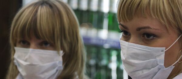 Медицинская маска. Архивное фото - Sputnik Казахстан